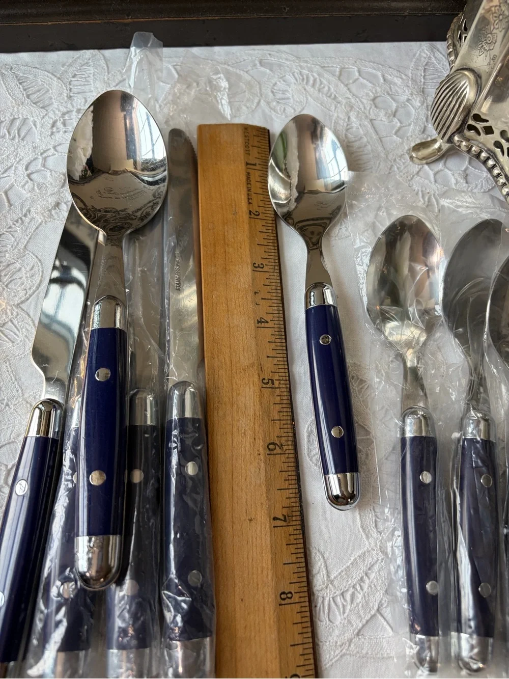 Blue & silver flatware set spoons and knives